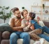 Happy family smiling and sitting on the couch