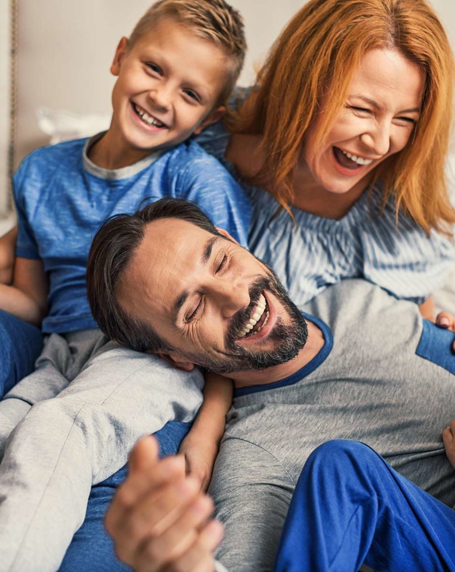 Woodcreek dental Family with clean white teeth